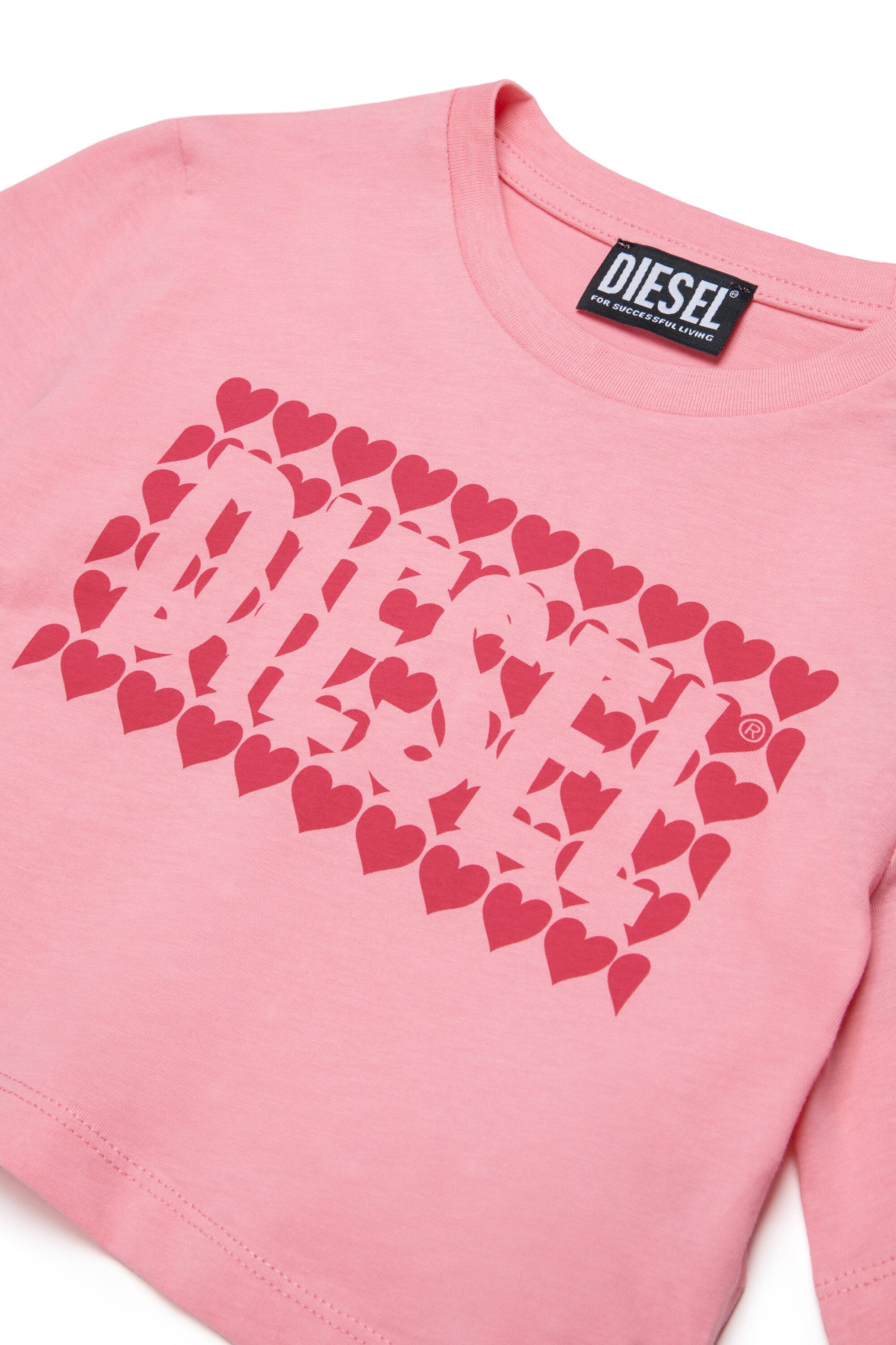 ロゴ入りTシャツ