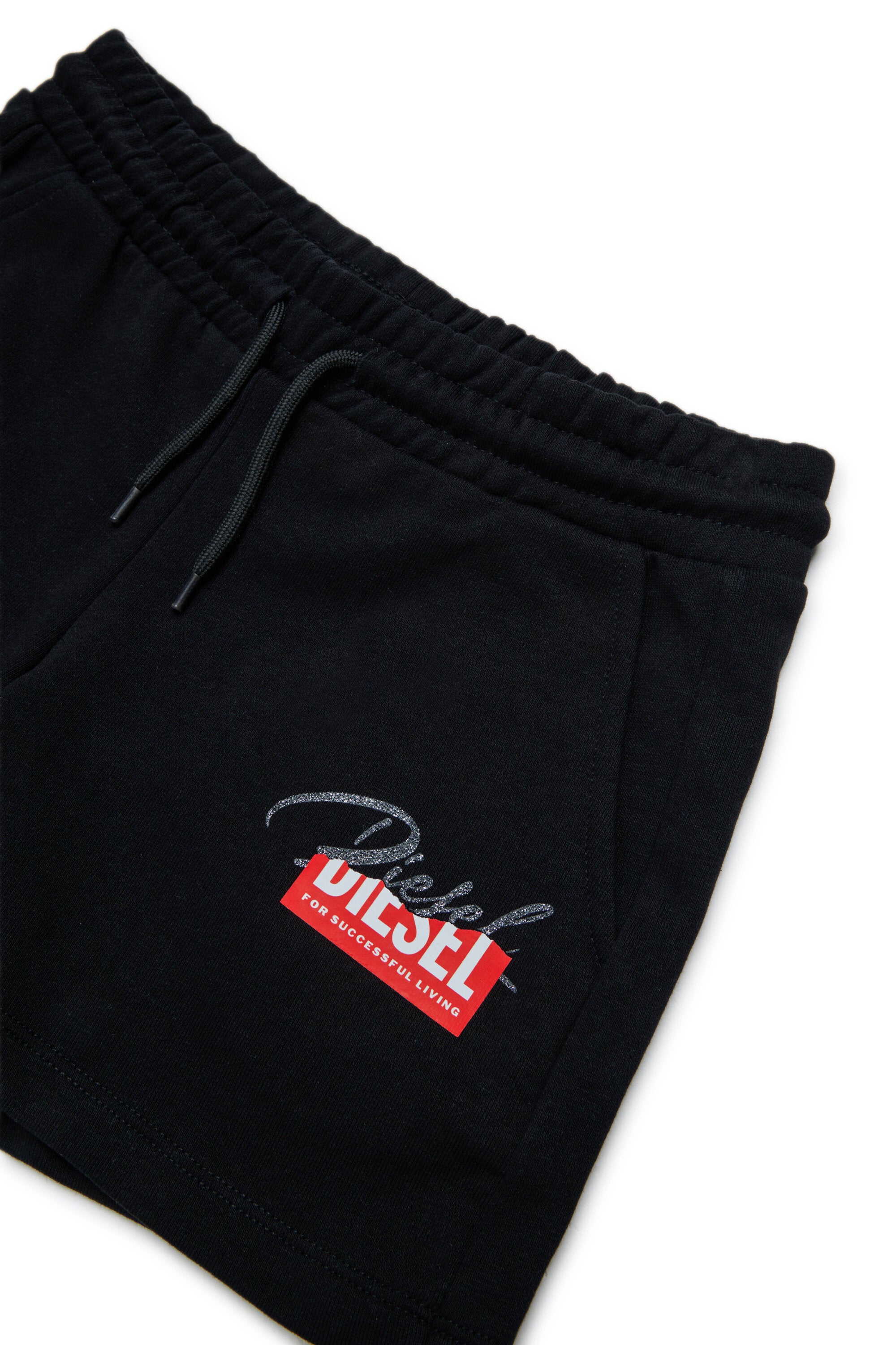 ロゴ入りトラックスーツ