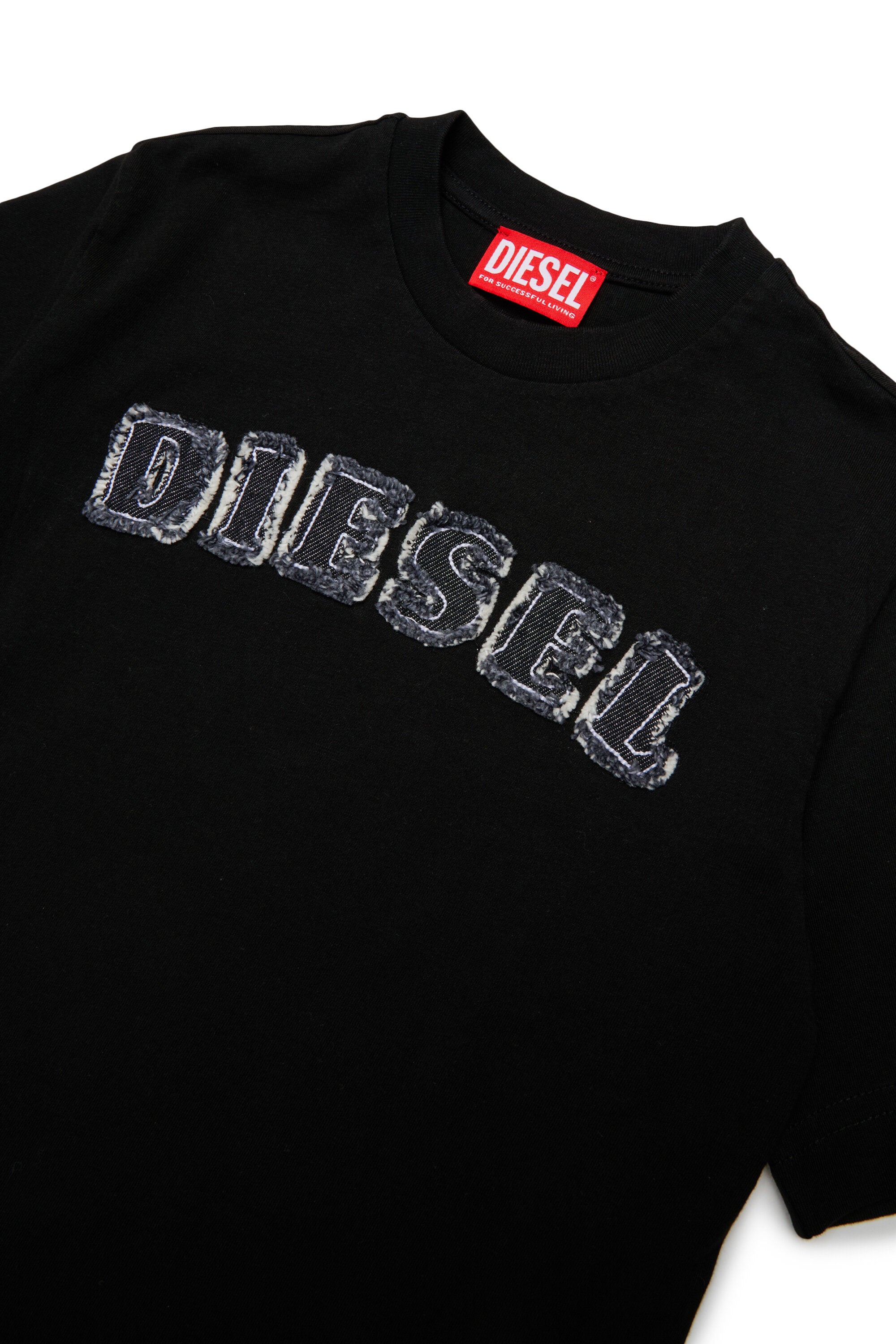 ロゴ入りTシャツ
