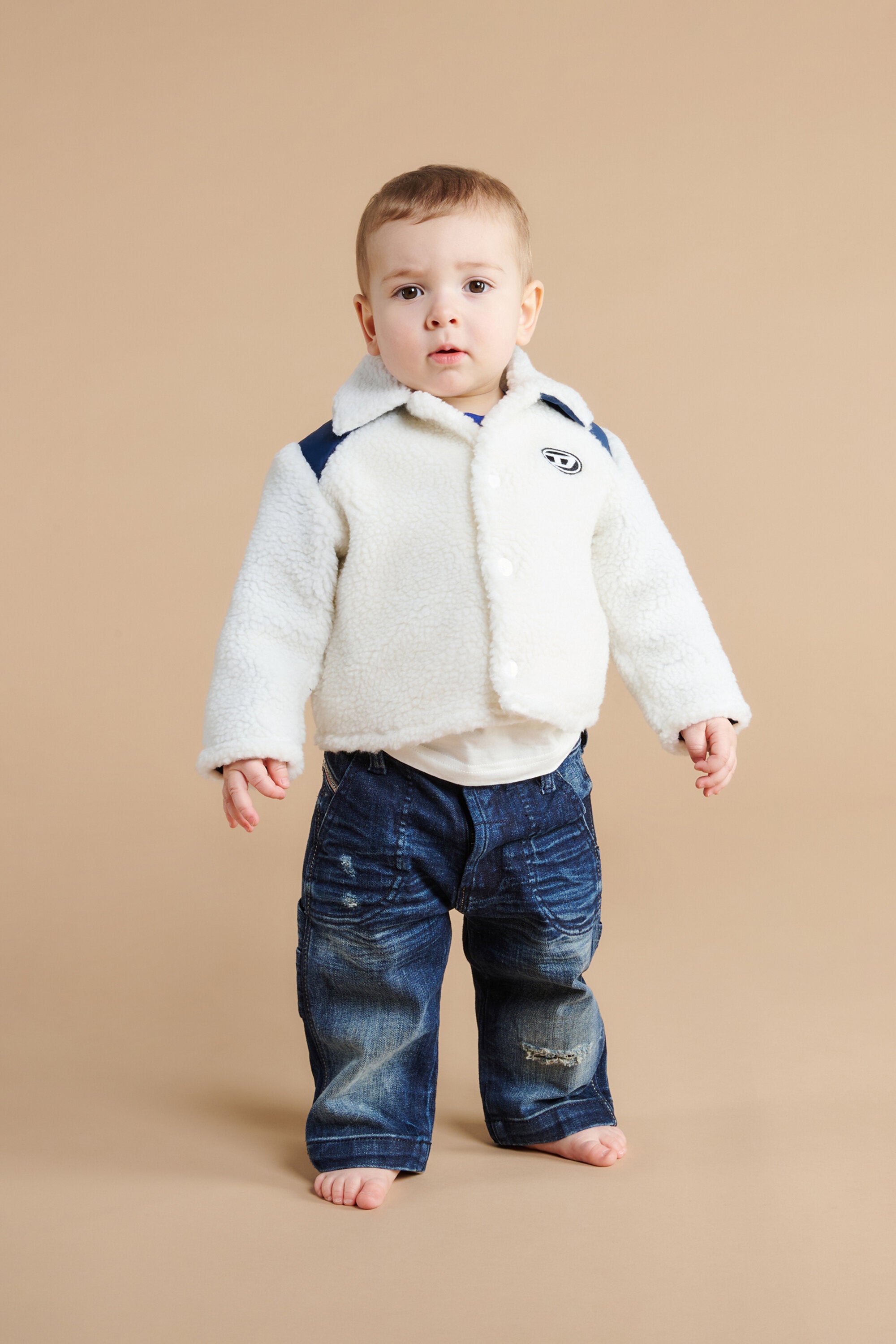 コントラストカラーのインサート入りテディジャケット