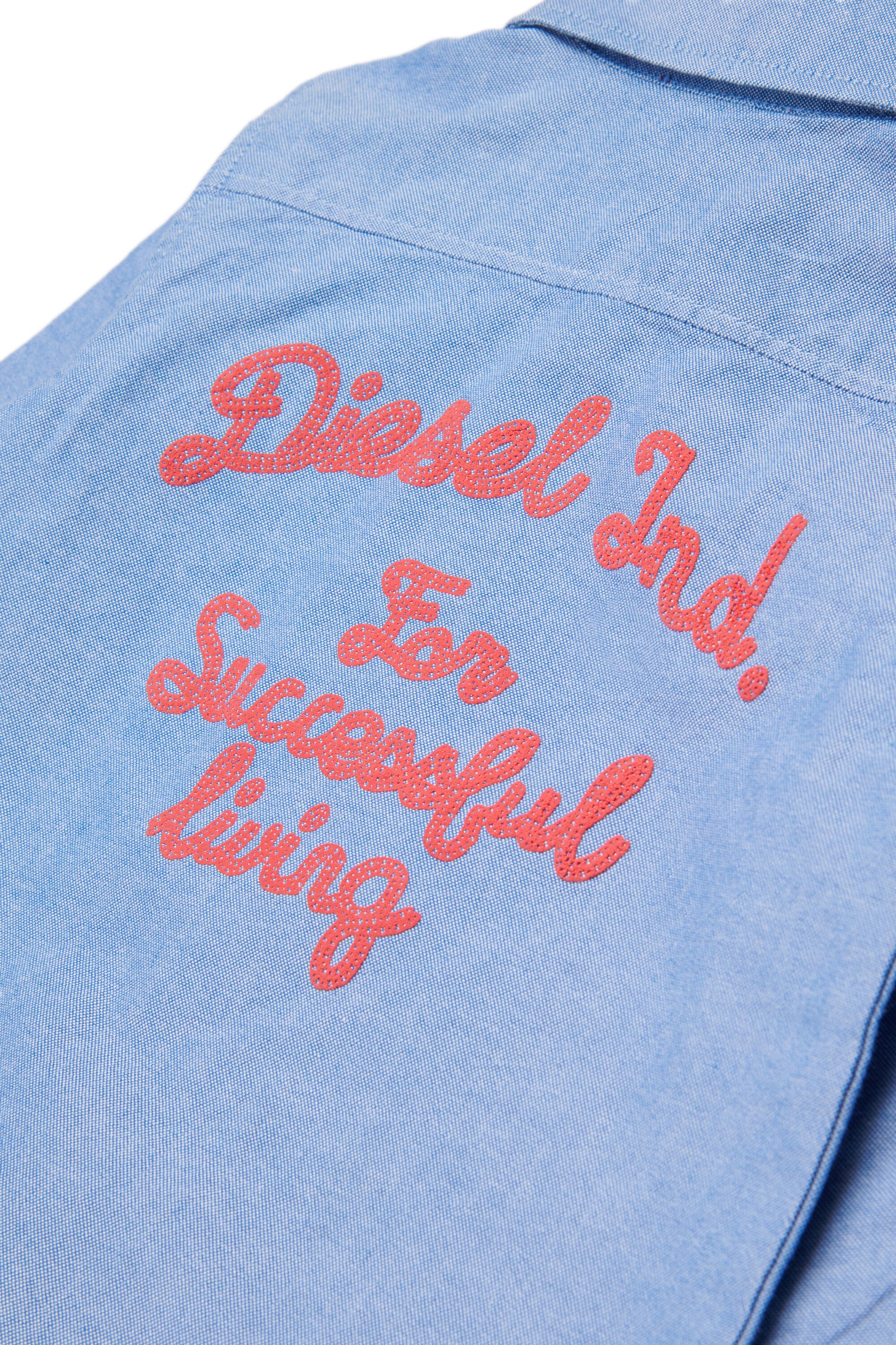 ロゴ付き長袖シャツ