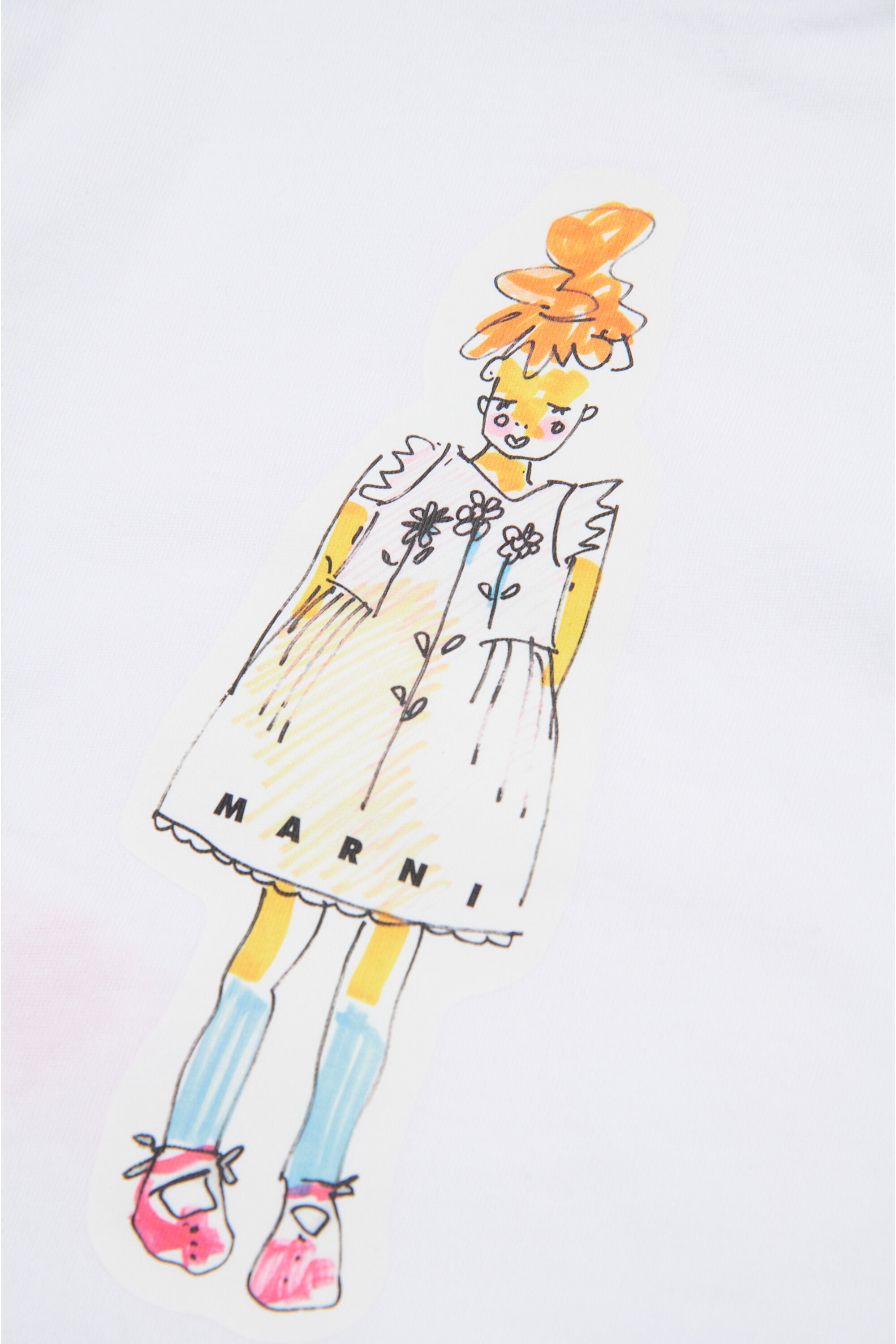 人形プリントのTシャツ