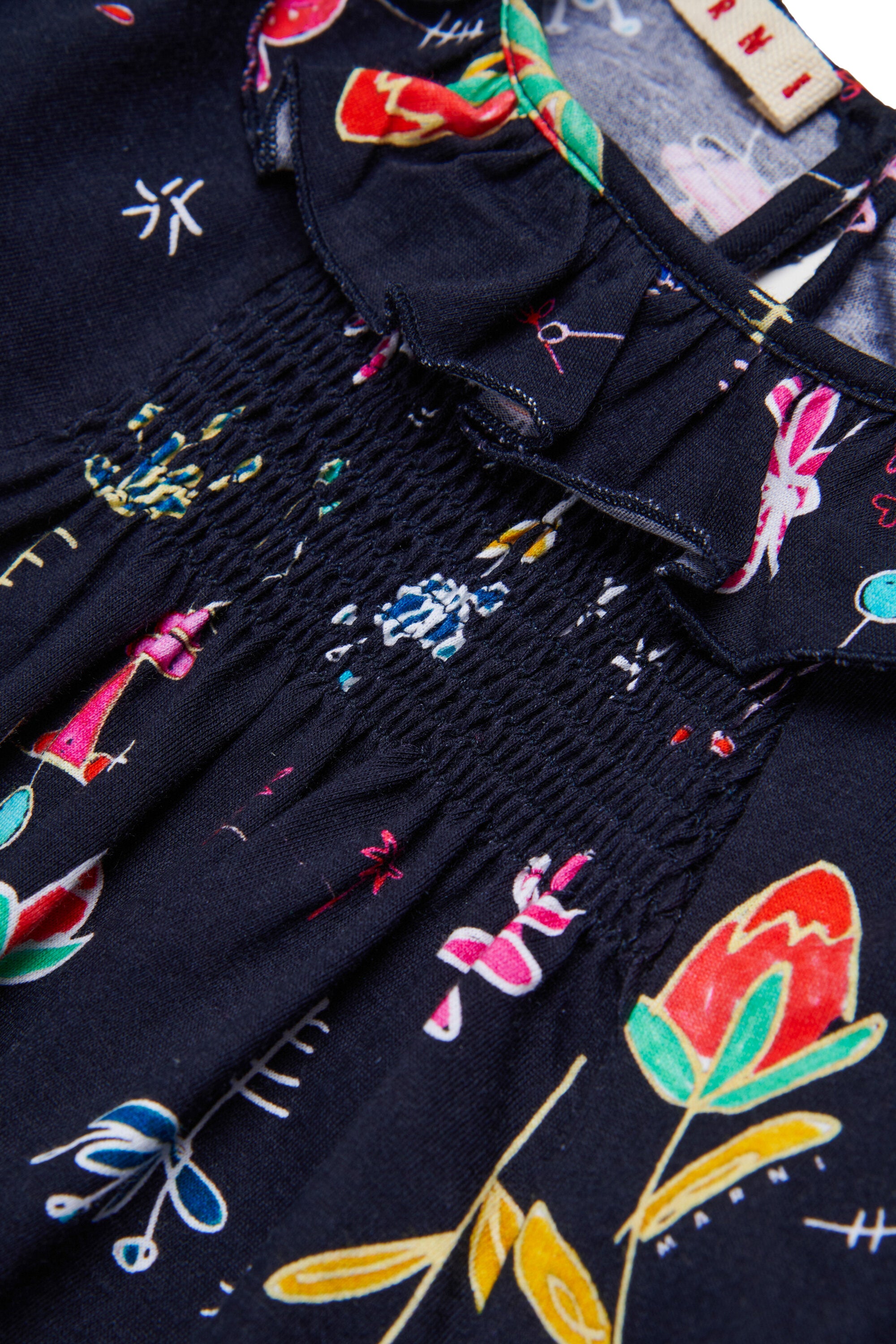 Nutcrackerの総柄ジャージーショートドレス