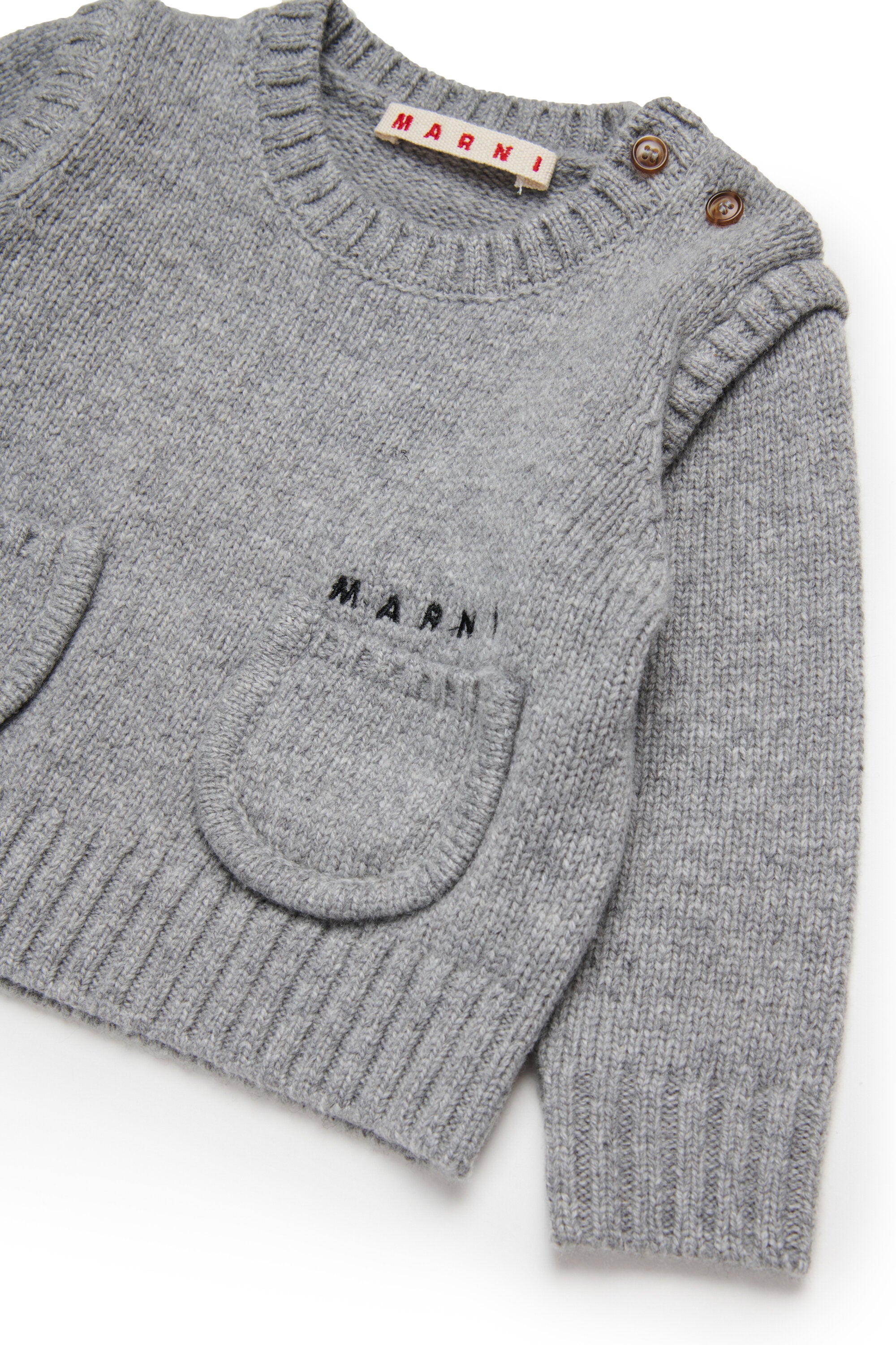 小さなポケットが付いたウール混のプルオーバー