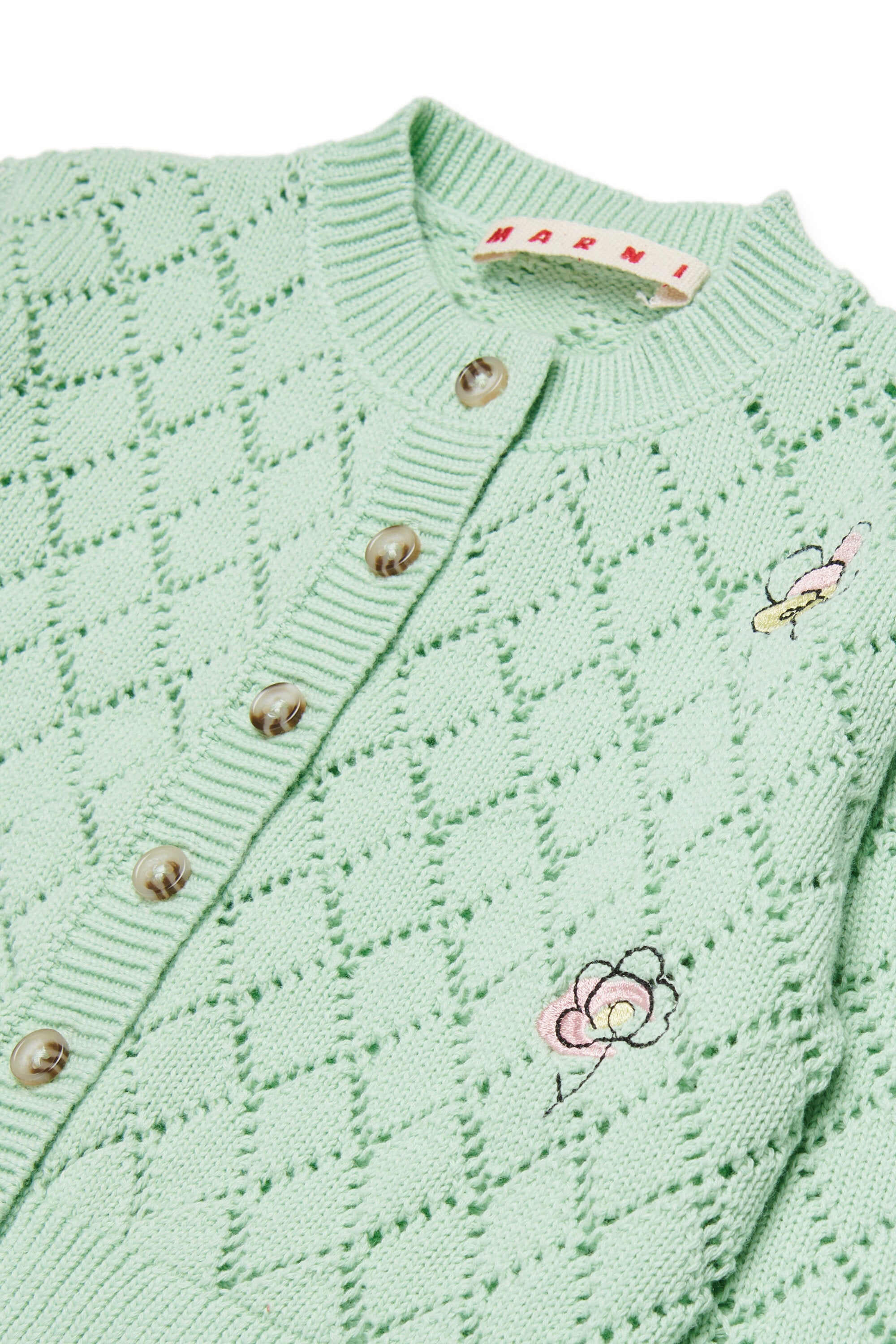 フローラル刺繍入りの透かし編みカーディガン