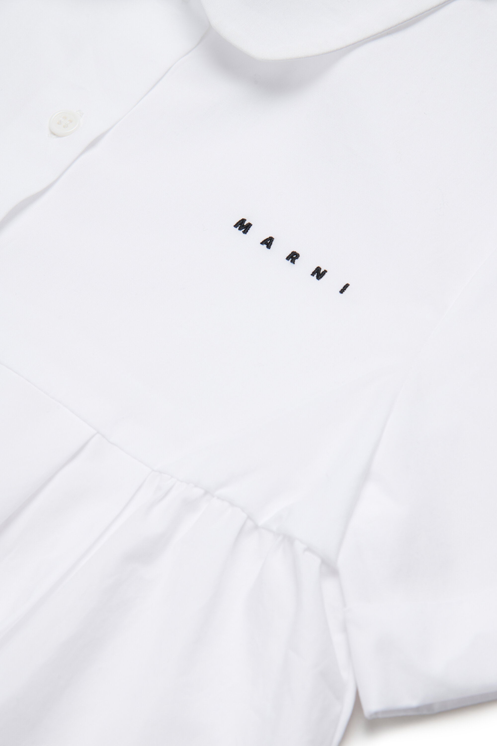 ロゴ入り半袖シャツ