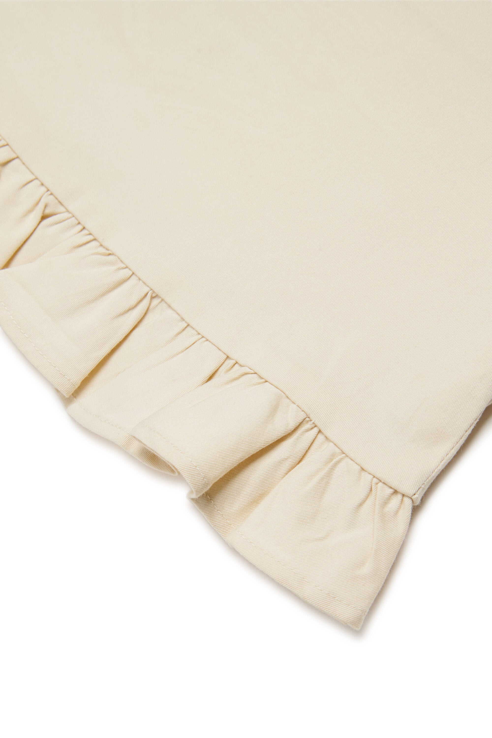 フリル付きノースリーブトップス ロゴ入り