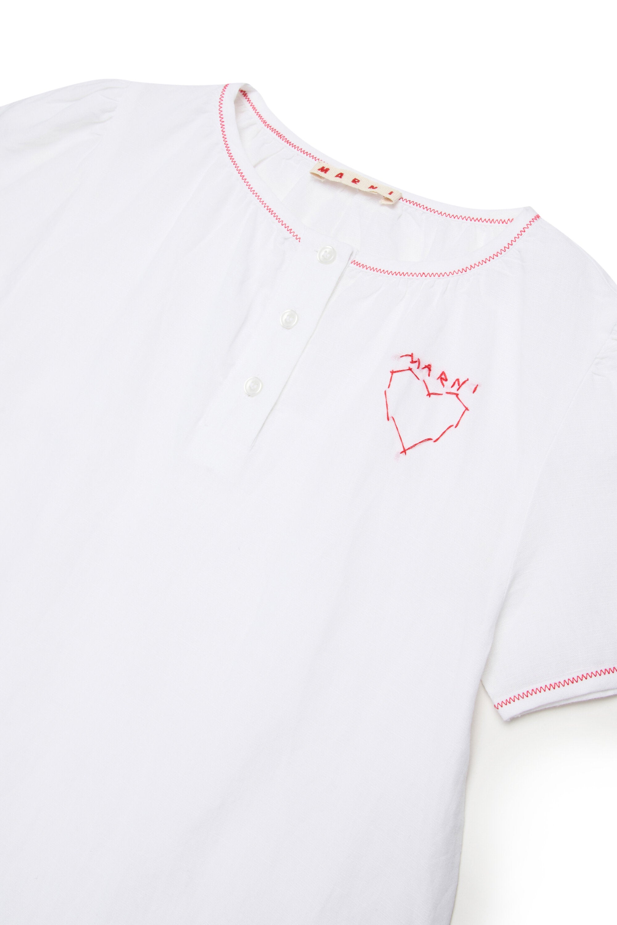 Dress with heart embroidery and ruffles