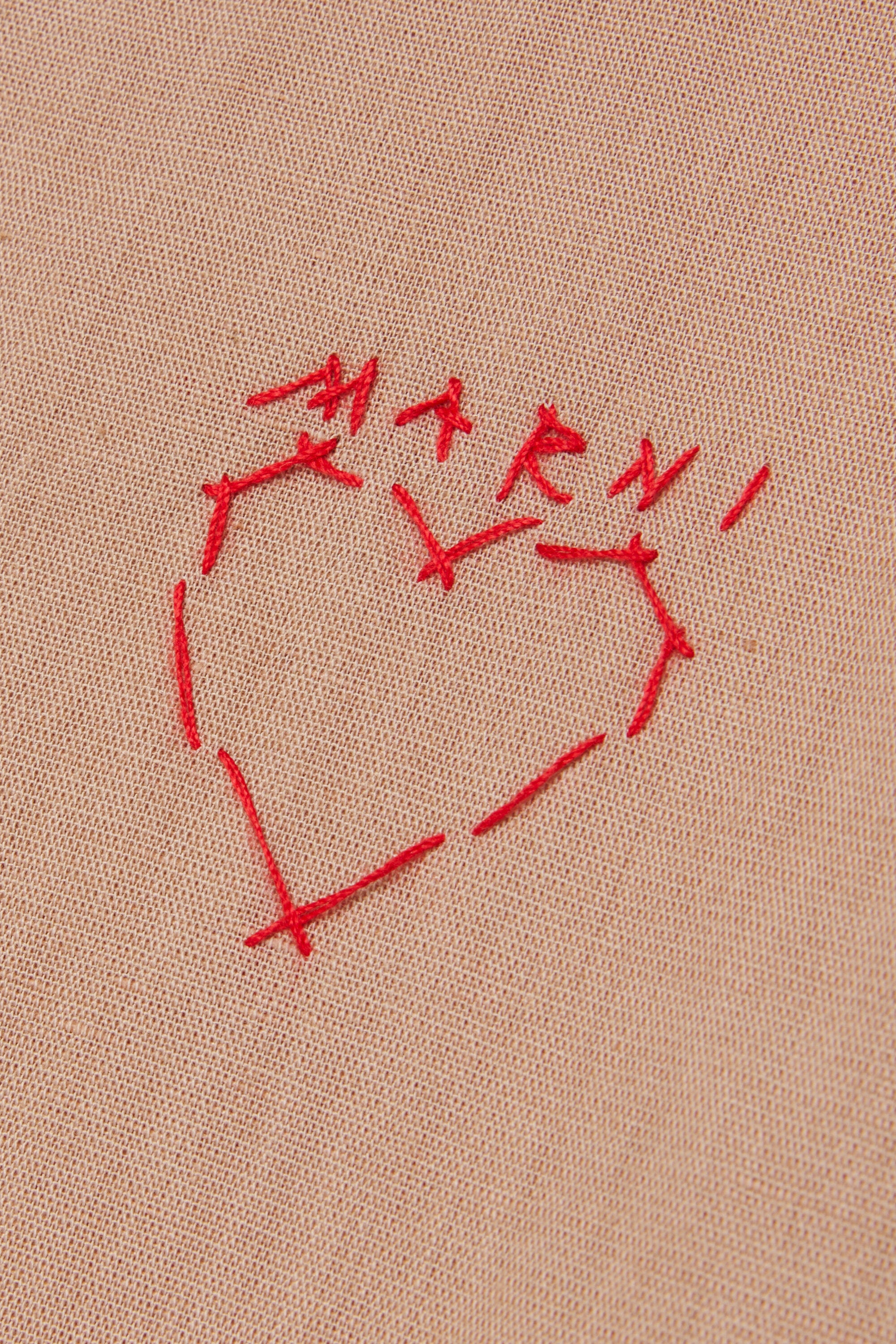 ハート刺繍入り長袖シャツ