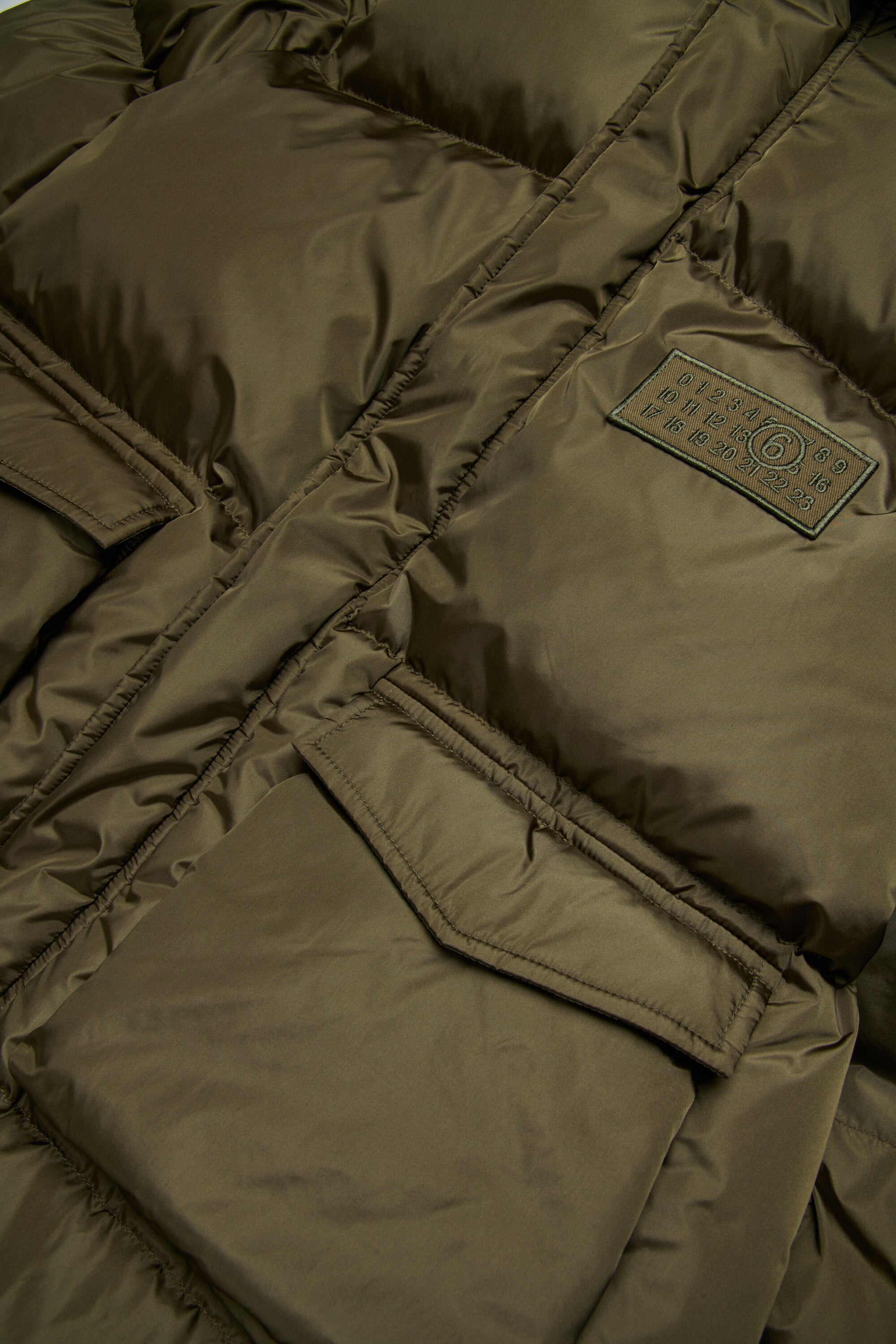 ポケット付きロング・ジャケット