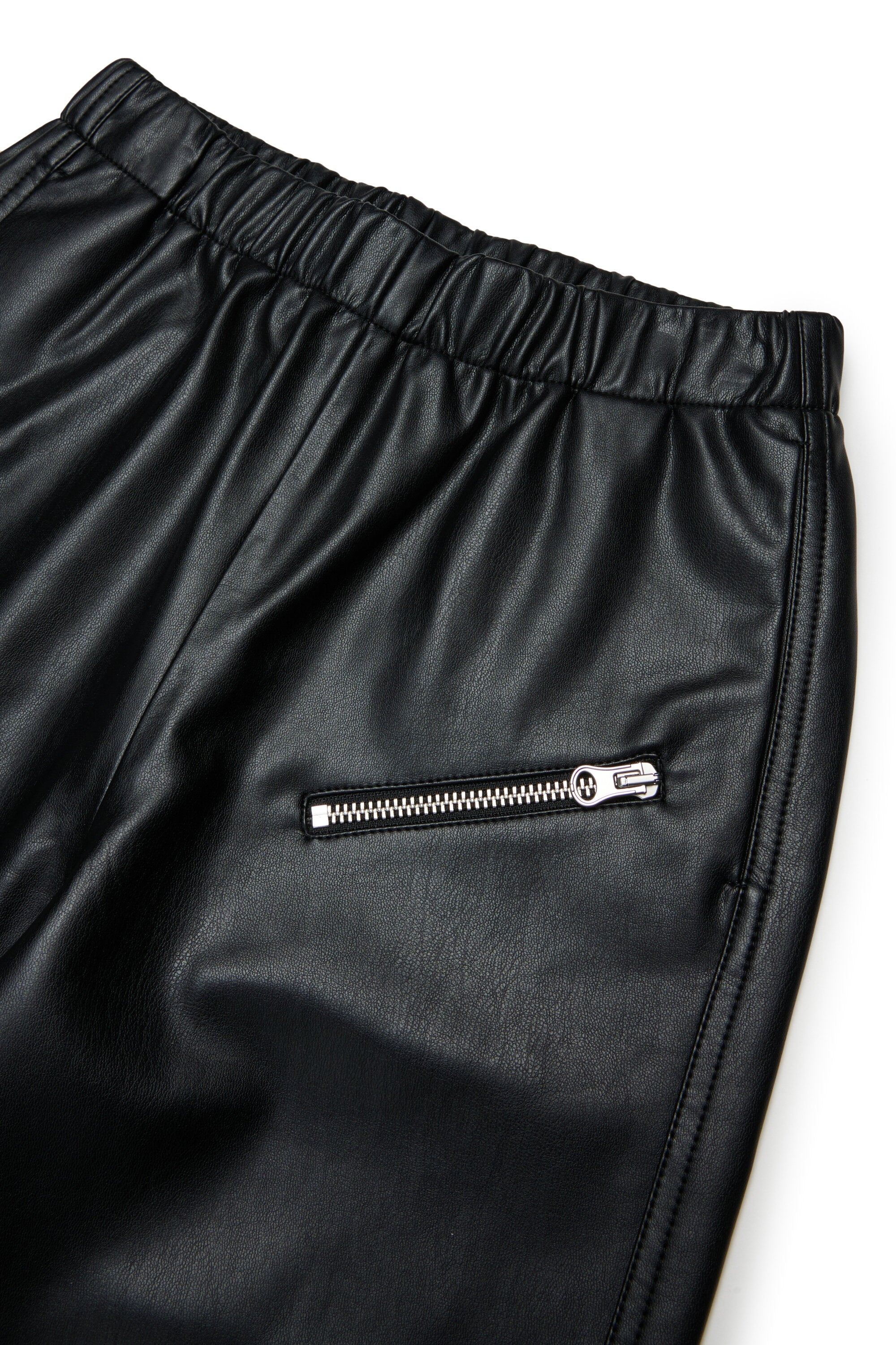 Pants made of coated fabric with zip