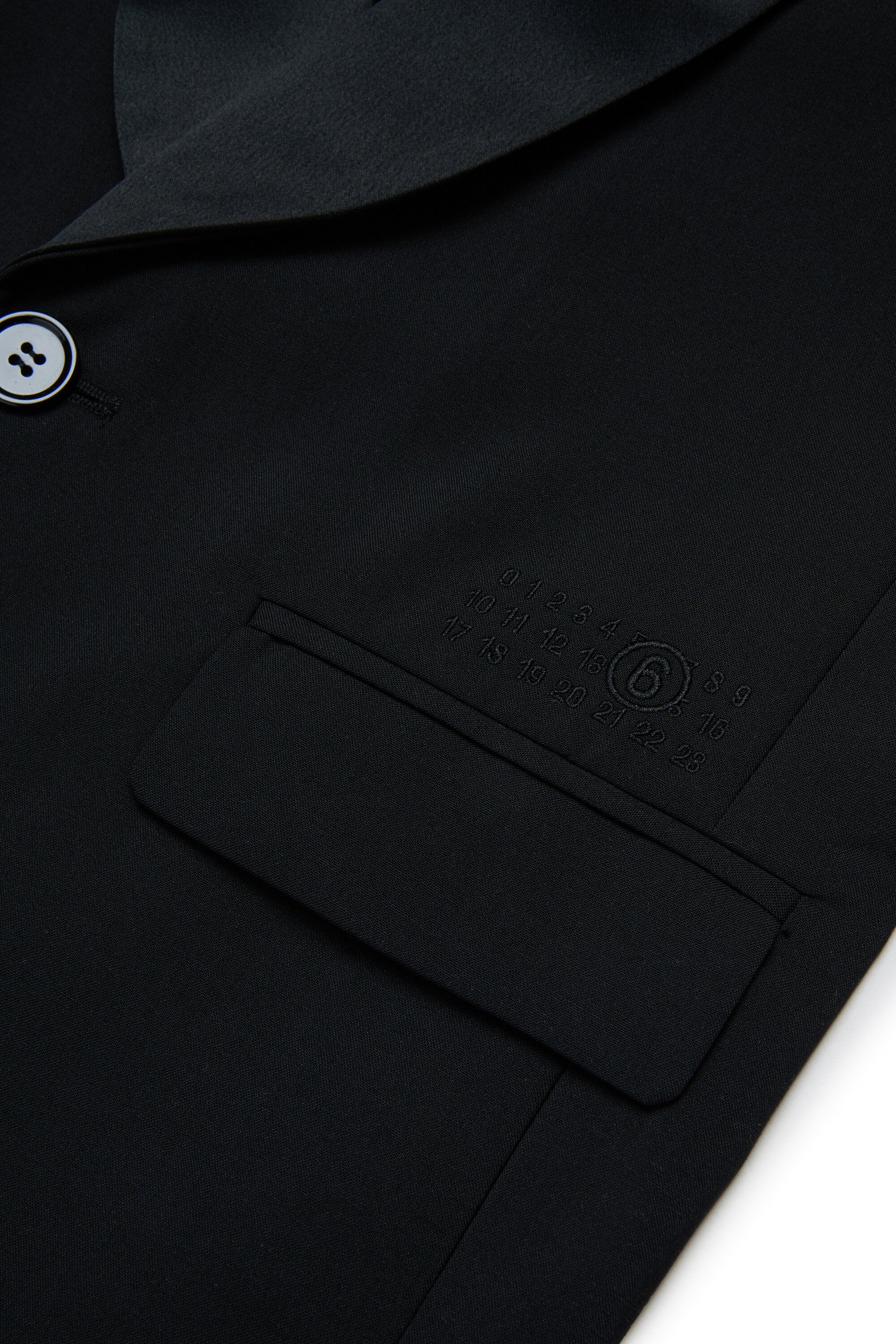 ロゴ入りノースリーブジャケット