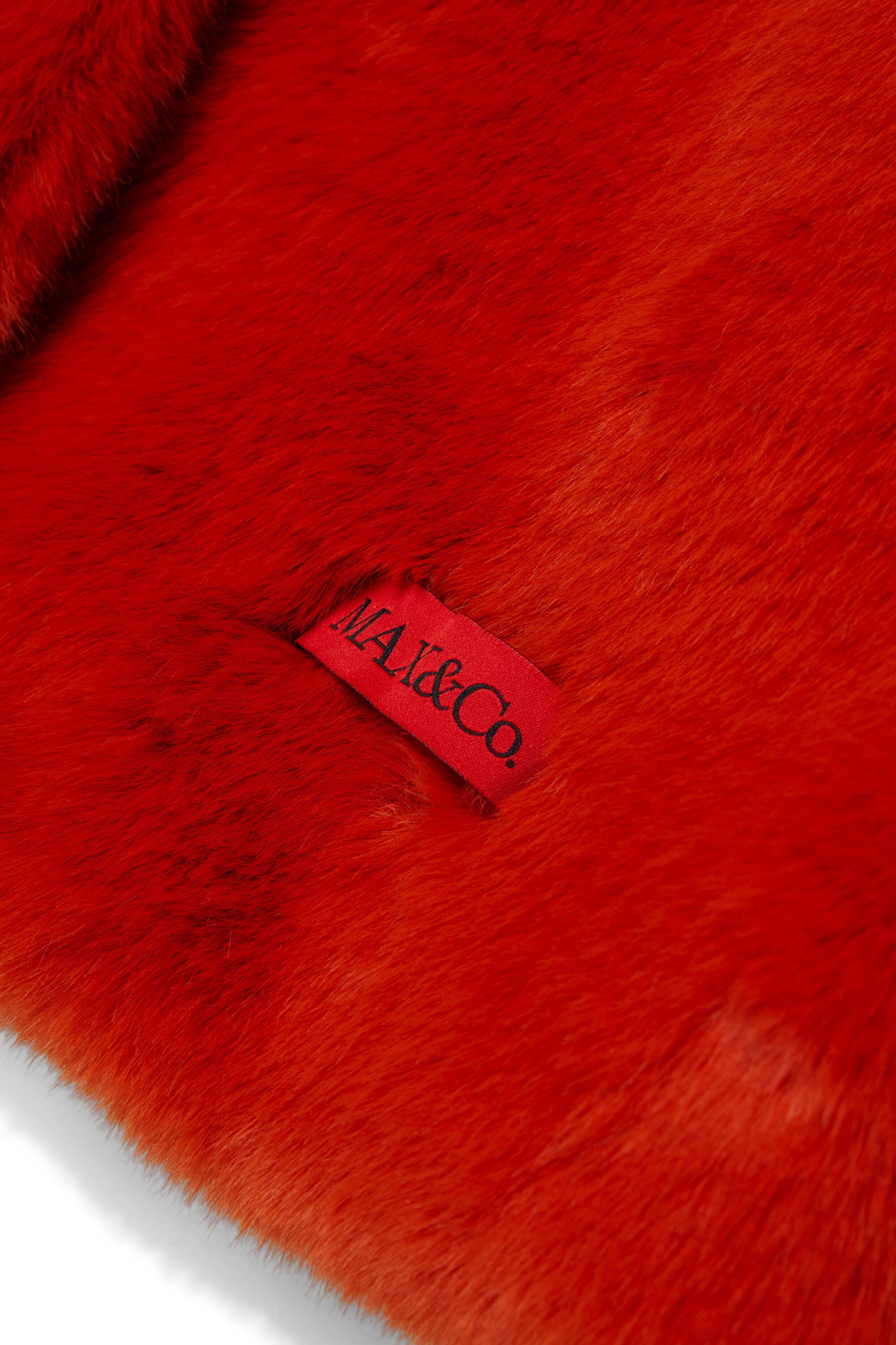 Faux fur jacket with logo