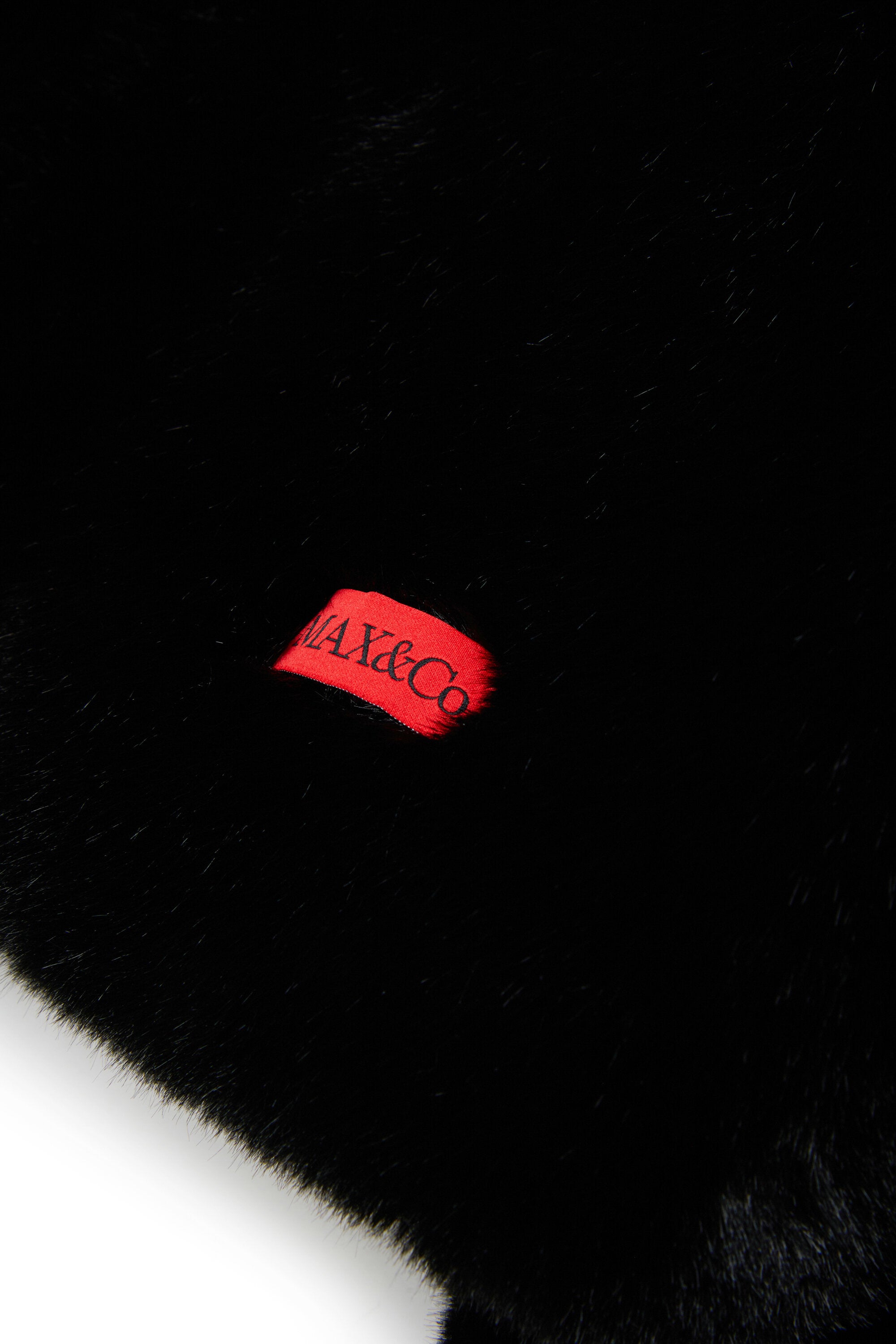 Faux fur jacket with logo