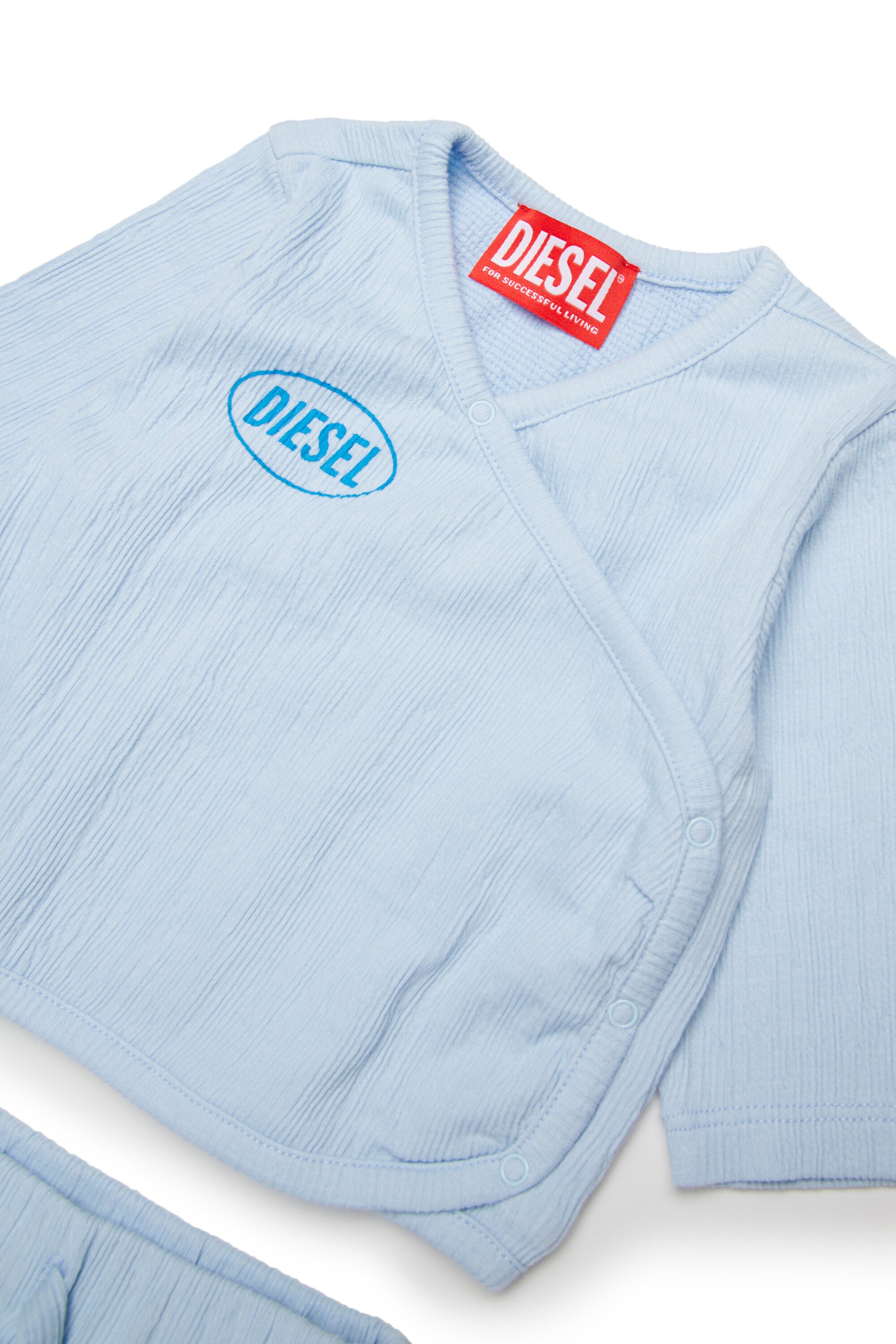 ロゴ付きベビーロンパース