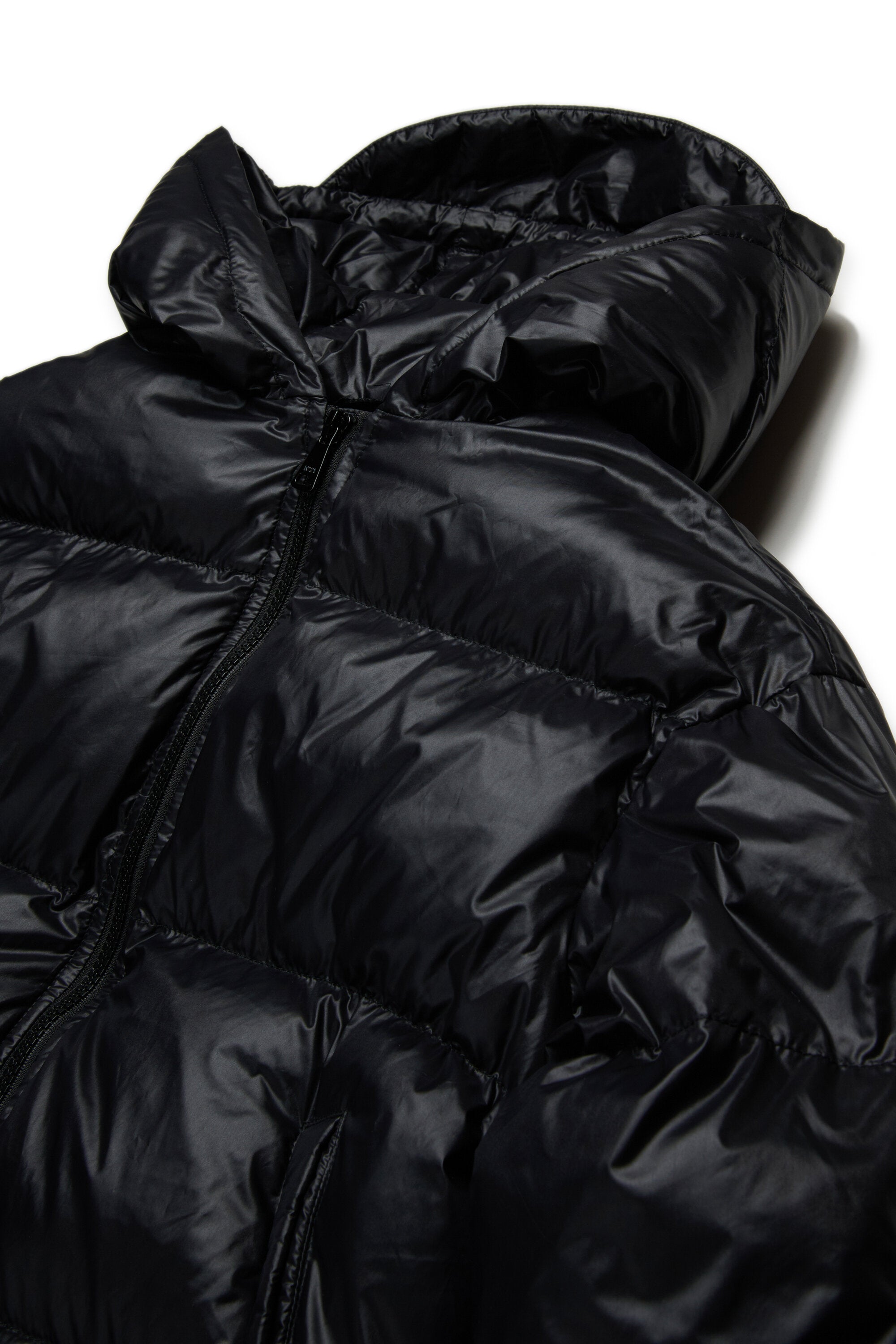 Short padded jacket with asymmetrical bottom