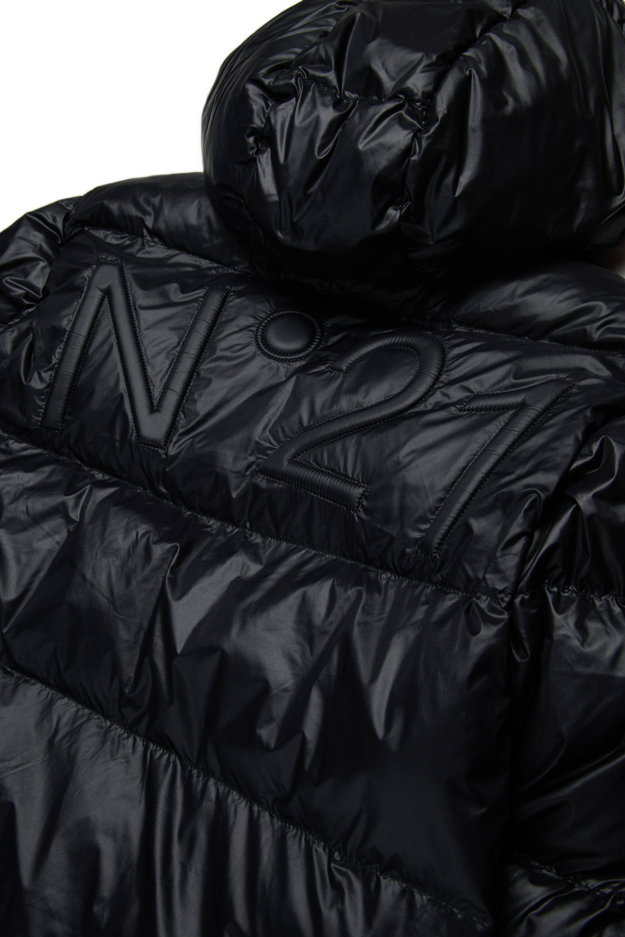 アシンメトリーなボトムのショート・パッド入りジャケット