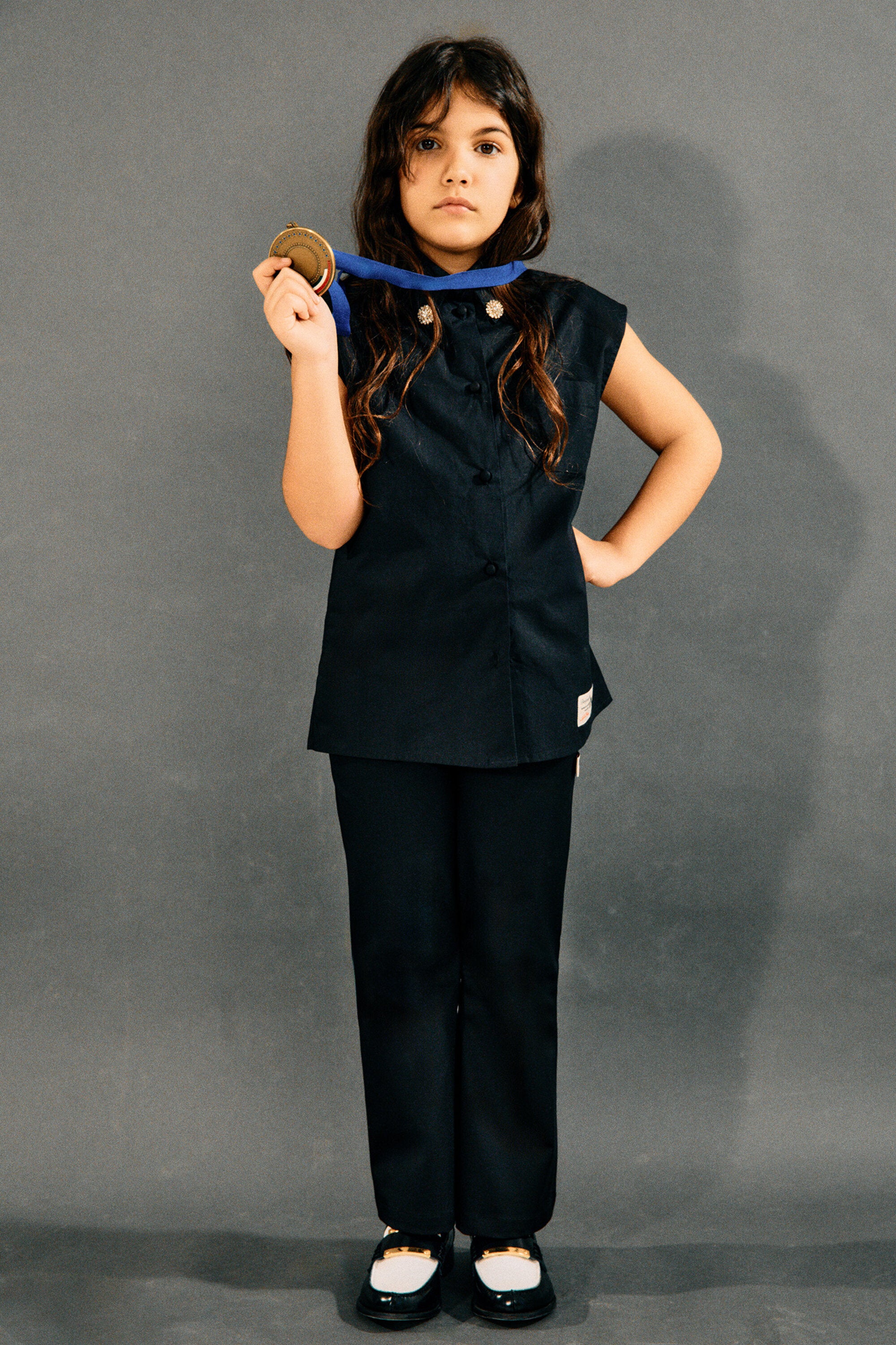 ロゴ入りノースリーブシャツ