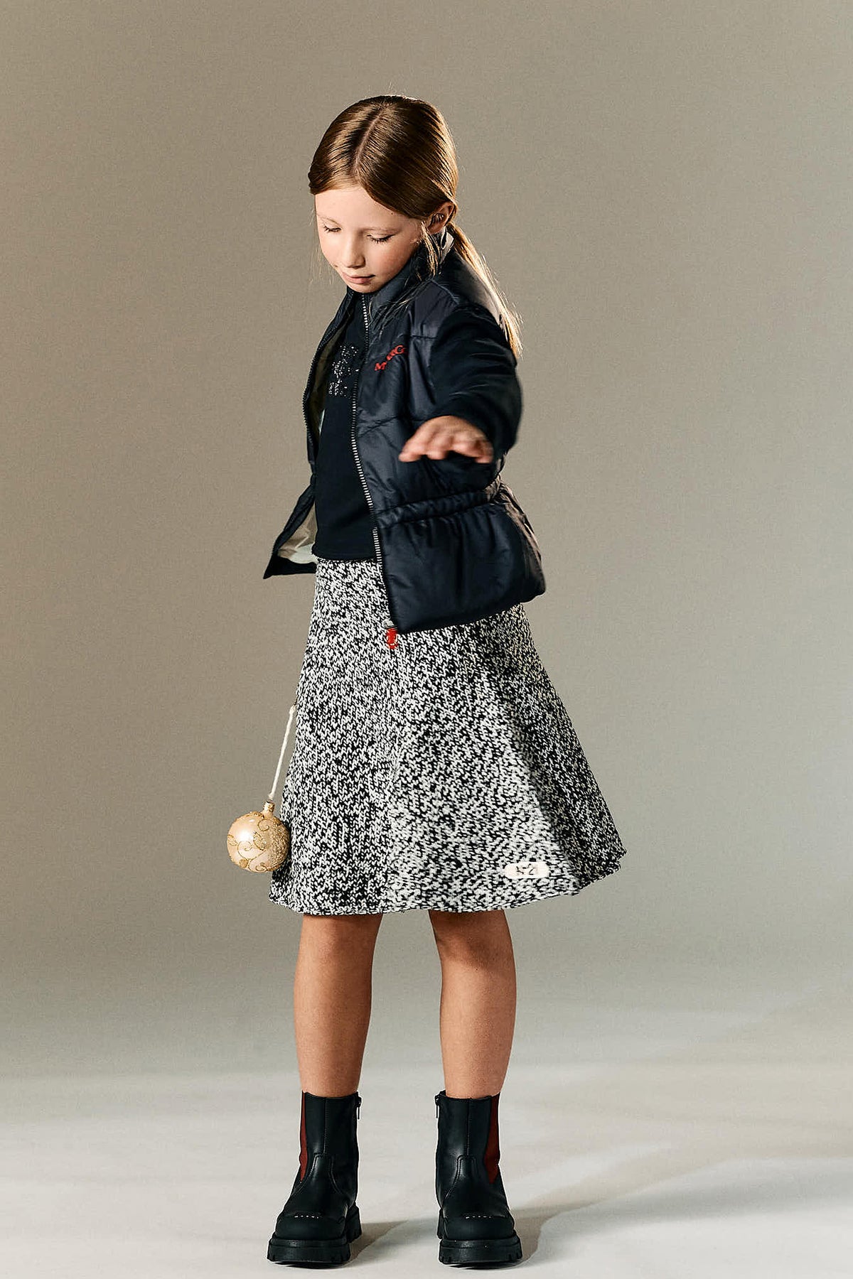 Short skirt in knit fabric with logo